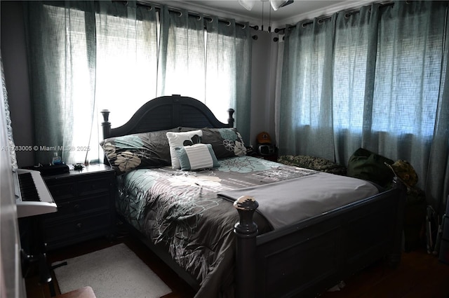 bedroom featuring wood finished floors