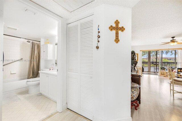 1351 SW 141st Ave Unit 313G, Pembroke Pines, FL 33027 - full bath with a closet, toilet, shower / tub combo, a ceiling fan, and vanity