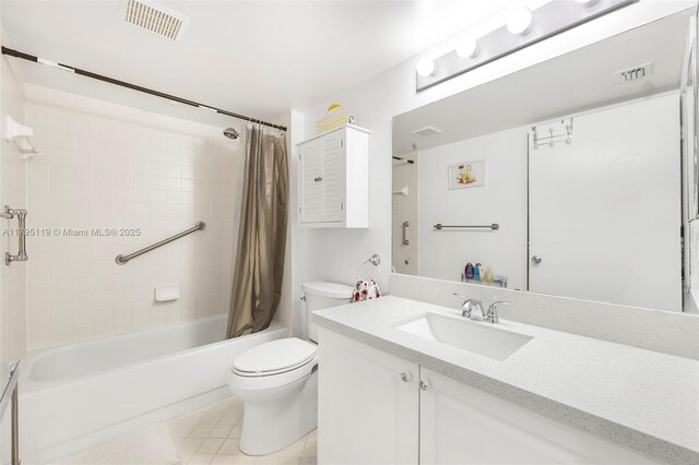 1351 SW 141st Ave Unit 313G, Pembroke Pines, FL 33027 - full bathroom featuring toilet, shower / tub combo with curtain, vanity, and tile patterned floors
