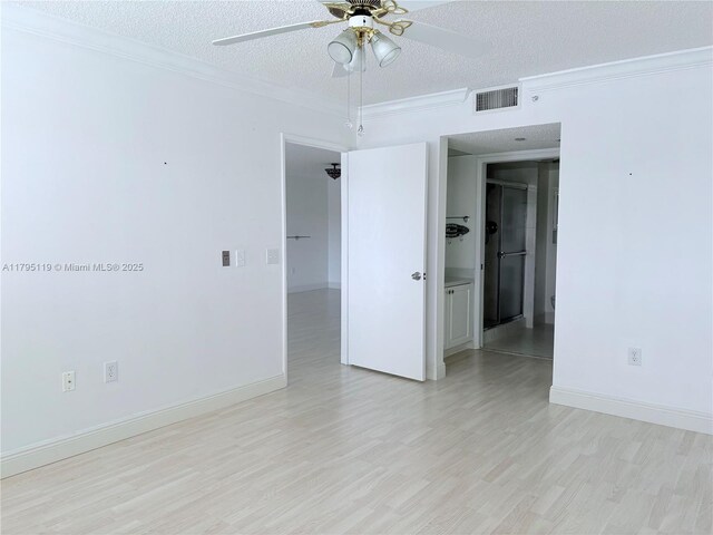 1351 SW 141st Ave Unit 313G, Pembroke Pines, FL 33027 - unfurnished room featuring ceiling fan, light wood-type flooring, a textured ceiling, ornamental molding, and baseboards