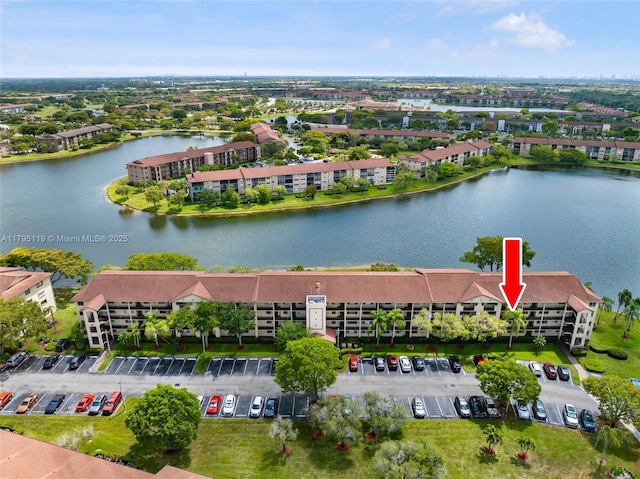 bird's eye view with a water view