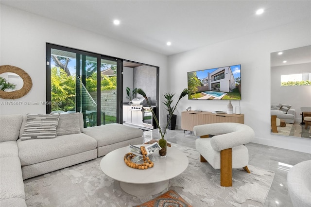 living room featuring recessed lighting
