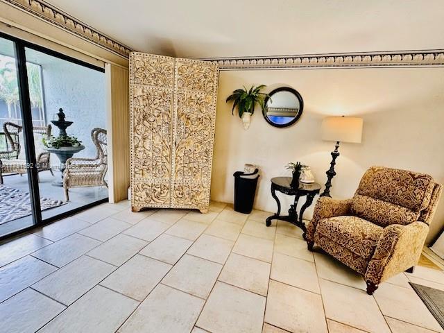 sitting room featuring light tile patterned floors