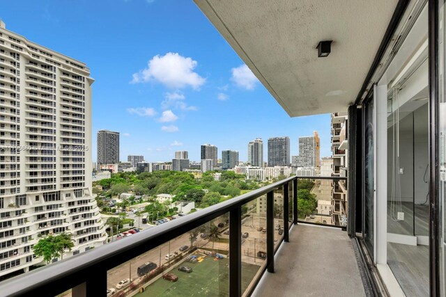 balcony featuring a view of city