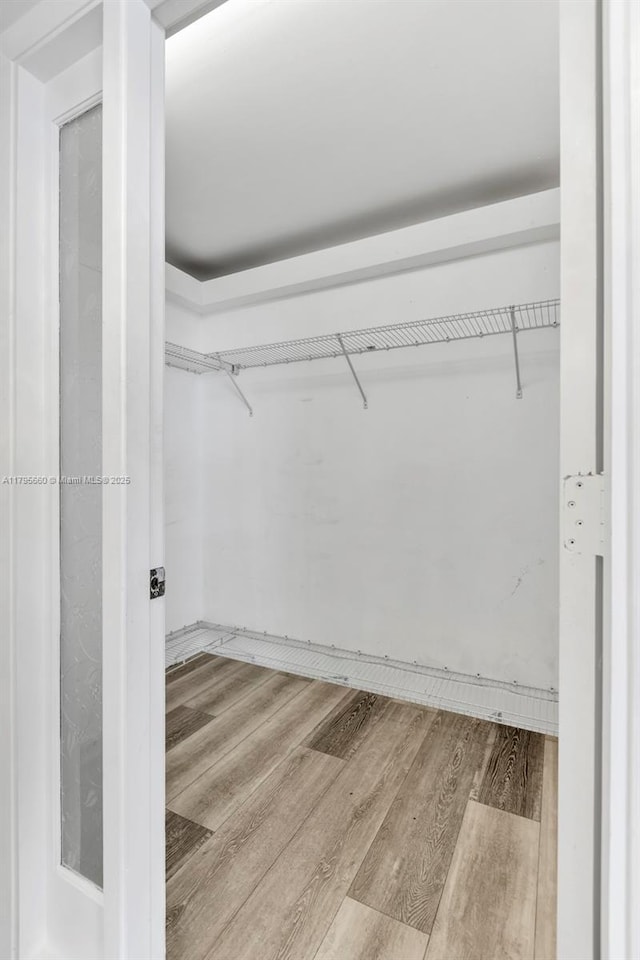 600 NE 36th St Unit 1404, Miami, FL 33137 - spacious closet with wood finished floors