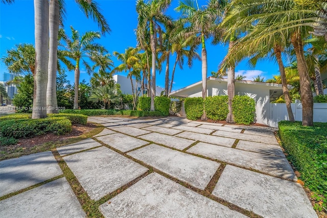 view of yard featuring a patio and fence