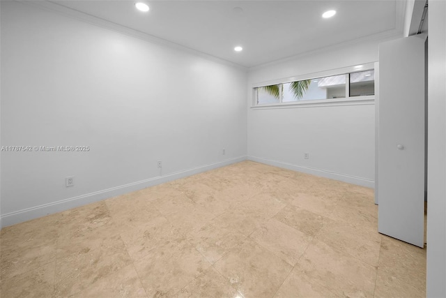 below grade area featuring baseboards, ornamental molding, and recessed lighting