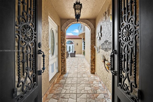 15870 NW 10th St, Pembroke Pines, FL 33028 - doorway to property with stucco siding