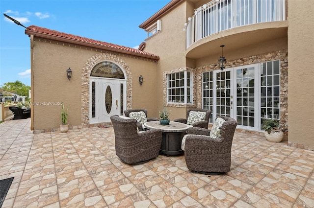 15870 NW 10th St, Pembroke Pines, FL 33028 - view of patio featuring french doors and a balcony
