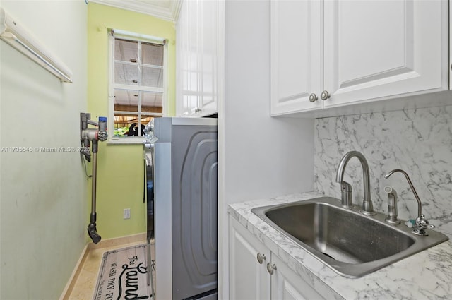 15870 NW 10th St, Pembroke Pines, FL 33028 - laundry room with cabinet space, washer / clothes dryer, and crown molding
