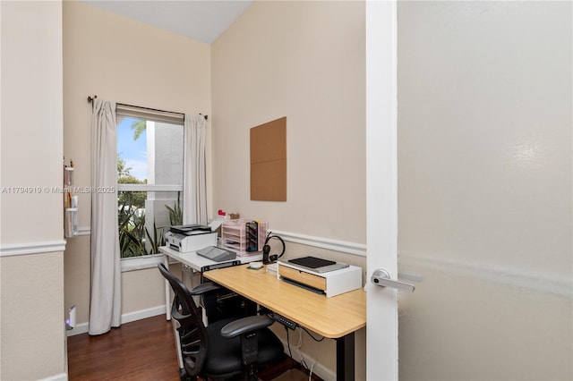 office featuring baseboards and dark wood-type flooring