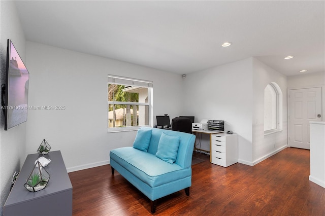 office space with recessed lighting, baseboards, and dark wood-style floors