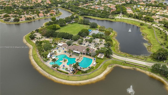 aerial view featuring a residential view and a water view