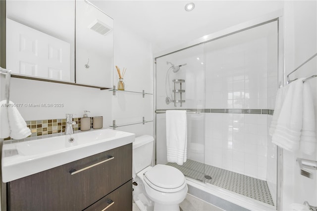 full bath featuring decorative backsplash, visible vents, a stall shower, vanity, and toilet