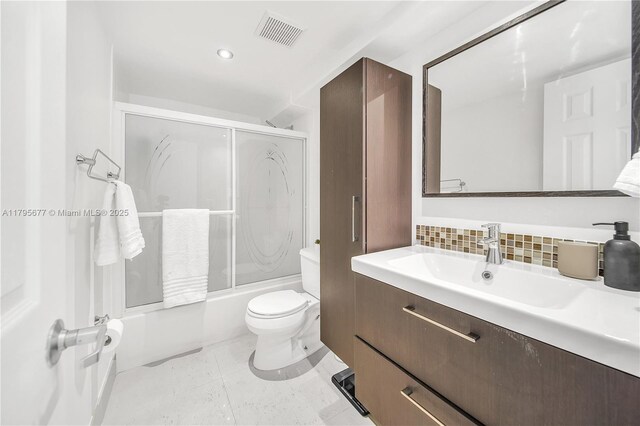 290 Sunrise Dr Unit 3-K, Key Biscayne, FL 33149 - full bathroom with vanity, enclosed tub / shower combo, toilet, and tasteful backsplash