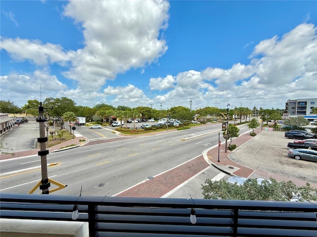 view of road featuring curbs and sidewalks