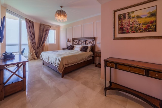 bedroom featuring an inviting chandelier