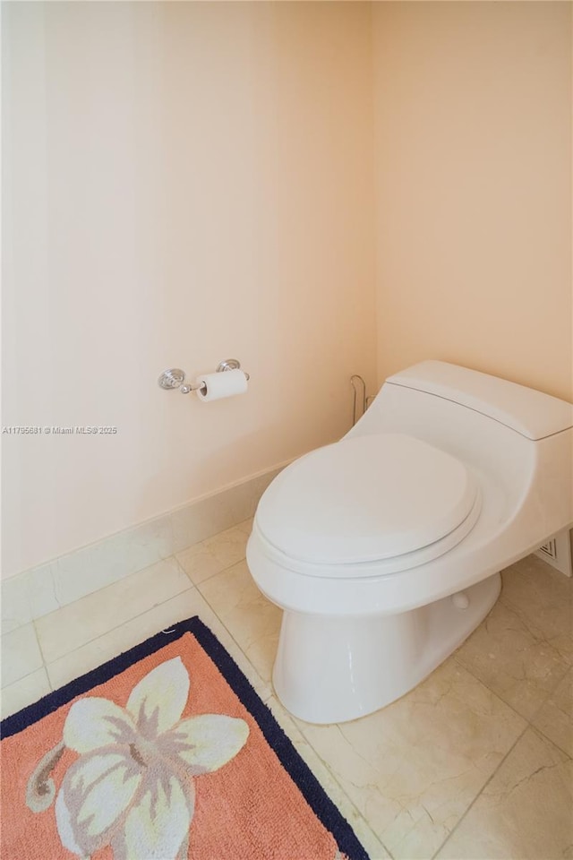 bathroom featuring toilet