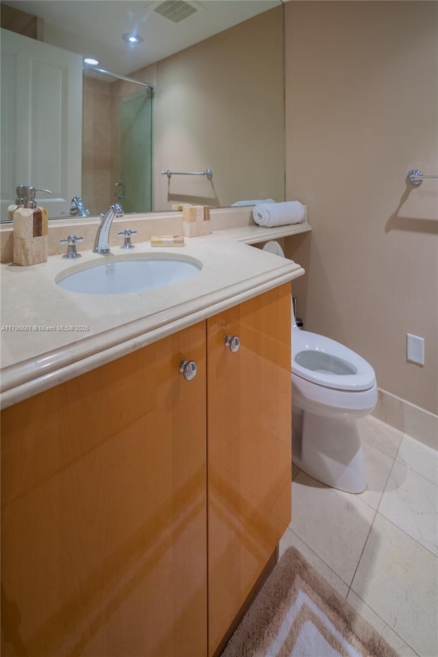 full bathroom with vanity, toilet, tile patterned floors, a shower stall, and visible vents