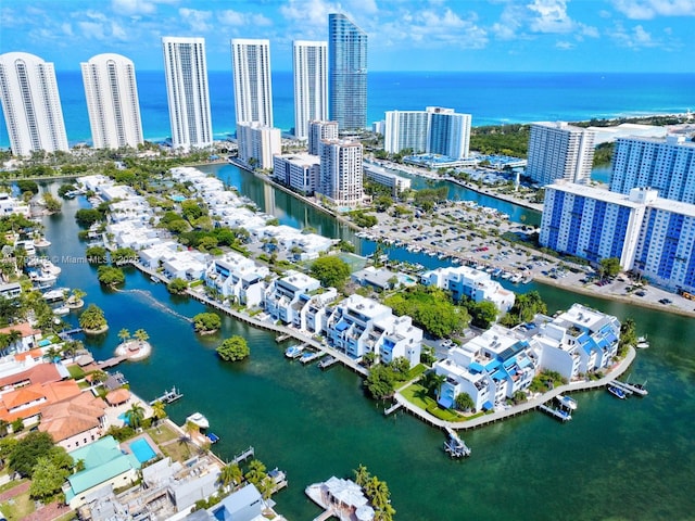 bird's eye view with a city view and a water view