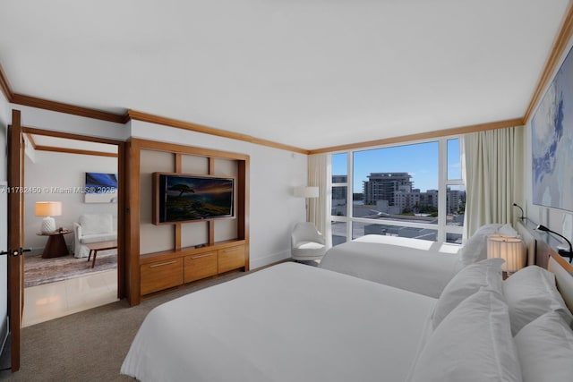 6801 Collins Ave Unit 702, Miami Beach, FL 33141 - carpeted bedroom featuring crown molding