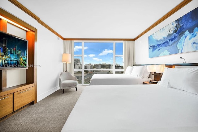 carpeted bedroom with baseboards, ornamental molding, and floor to ceiling windows