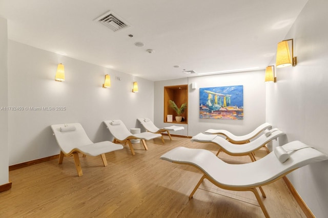 6801 Collins Ave Unit 702, Miami Beach, FL 33141 - living area with wood finished floors and baseboards