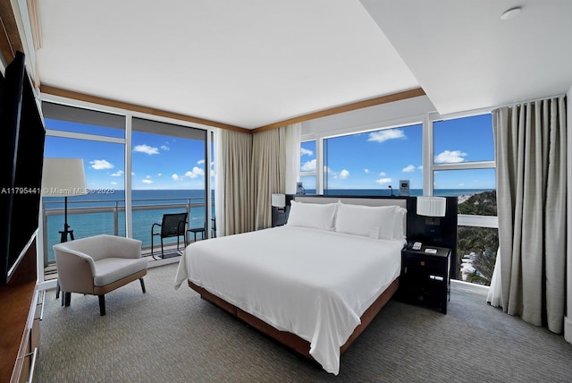 6801 Collins Ave Unit 605, Miami Beach, FL 33141 - bedroom with a wall of windows and a water view
