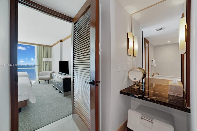 6801 Collins Ave Unit 605, Miami Beach, FL 33141 - hallway with carpet