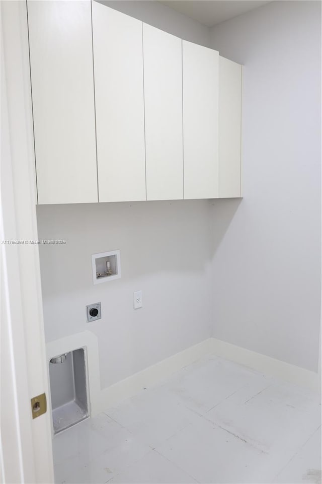 clothes washing area with cabinet space, hookup for a washing machine, marble finish floor, baseboards, and hookup for an electric dryer