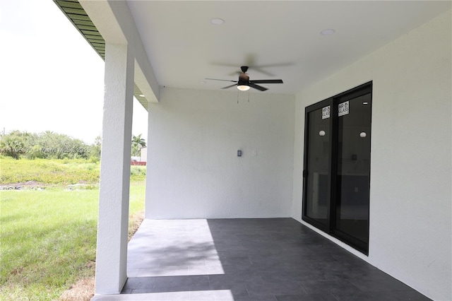 view of patio featuring a ceiling fan