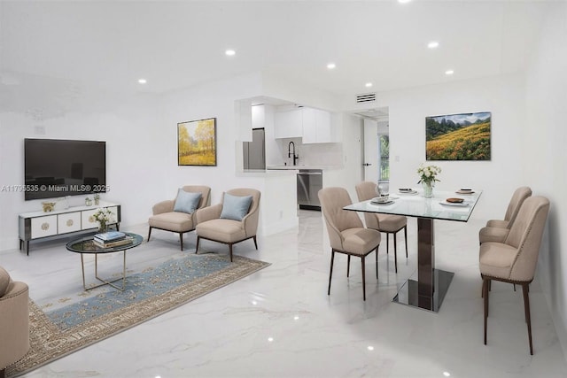 dining area with visible vents, recessed lighting, and marble finish floor