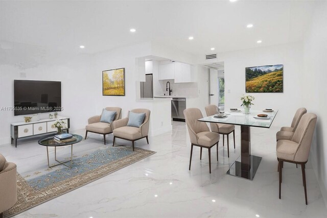 13250 SW 7th Ct Unit 204L, Pembroke Pines, FL 33027 - dining space with light marble finish floors and recessed lighting