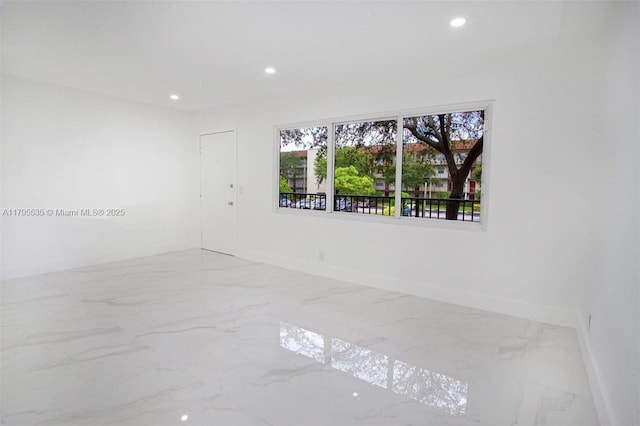 13250 SW 7th Ct Unit 204L, Pembroke Pines, FL 33027 - empty room featuring baseboards, marble tiled flooring, and recessed lighting