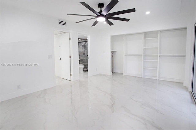 unfurnished bedroom featuring visible vents, marble finish floor, baseboards, a ceiling fan, and ensuite bath