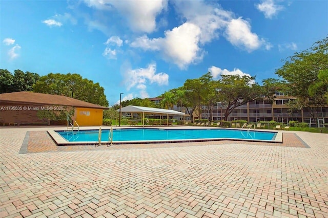 community pool featuring a patio