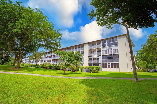 13250 SW 7th Ct Unit 204L, Pembroke Pines, FL 33027 - view of apartment building / complex