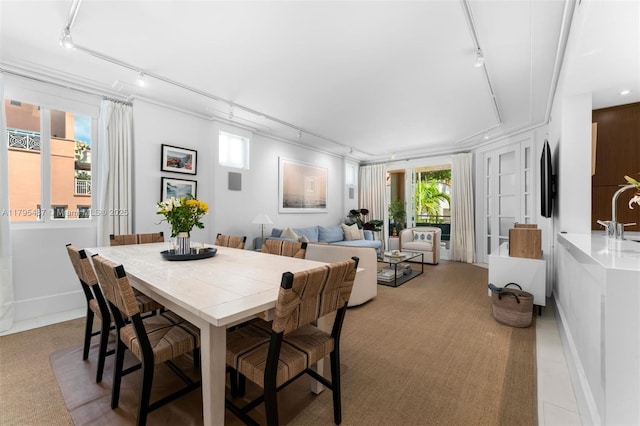 125 Jefferson Ave Unit 113, Miami Beach, FL 33139 - dining space with track lighting and light carpet