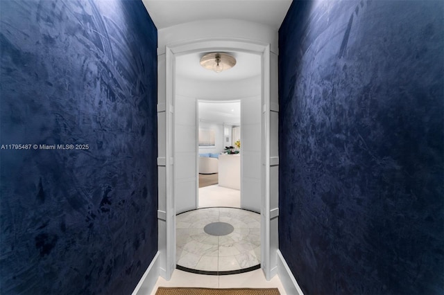 125 Jefferson Ave Unit 113, Miami Beach, FL 33139 - hallway featuring baseboards and tile patterned floors