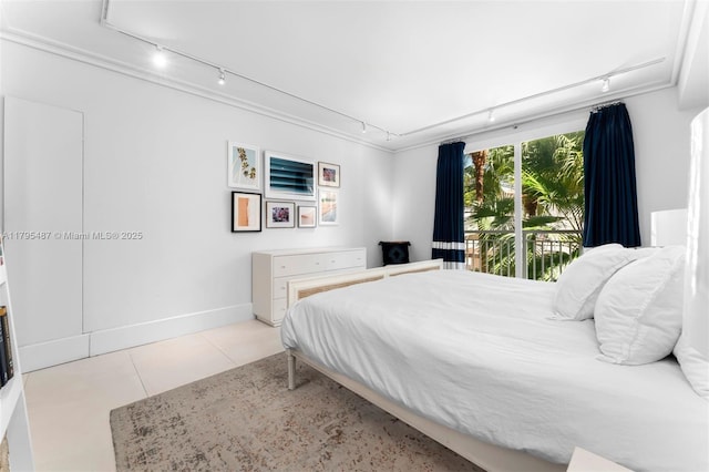 125 Jefferson Ave Unit 113, Miami Beach, FL 33139 - bedroom featuring track lighting and tile patterned flooring