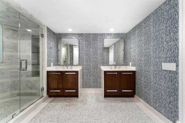 125 Jefferson Ave Unit 113, Miami Beach, FL 33139 - bathroom featuring a sink, a stall shower, tile patterned floors, and two vanities