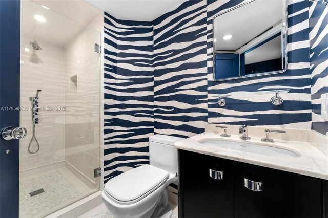 125 Jefferson Ave Unit 113, Miami Beach, FL 33139 - bathroom with vanity, toilet, and a shower stall
