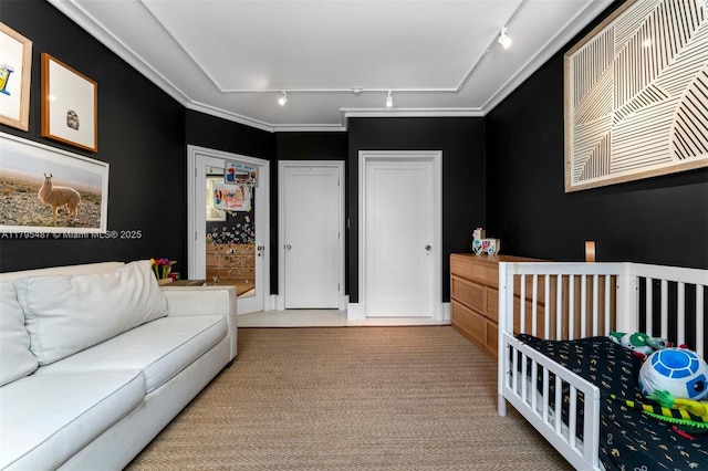 125 Jefferson Ave Unit 113, Miami Beach, FL 33139 - bedroom featuring crown molding, track lighting, and carpet