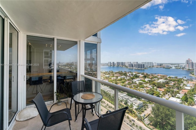 balcony with a city view and a water view