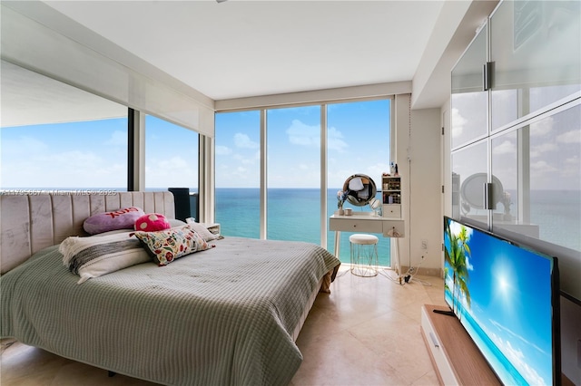 bedroom with light tile patterned floors