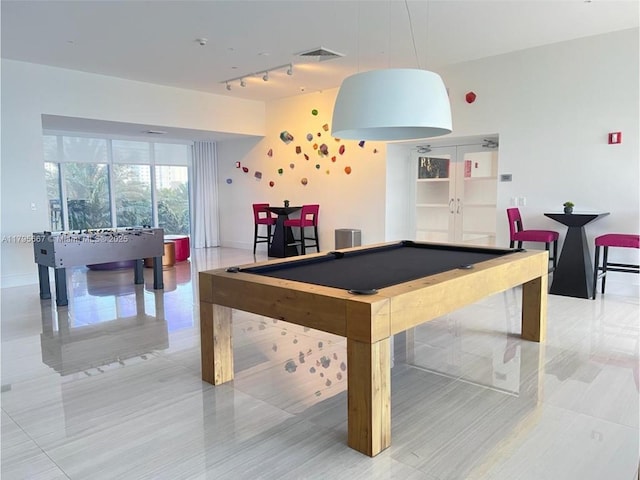 game room with visible vents, pool table, rail lighting, light tile patterned floors, and baseboards