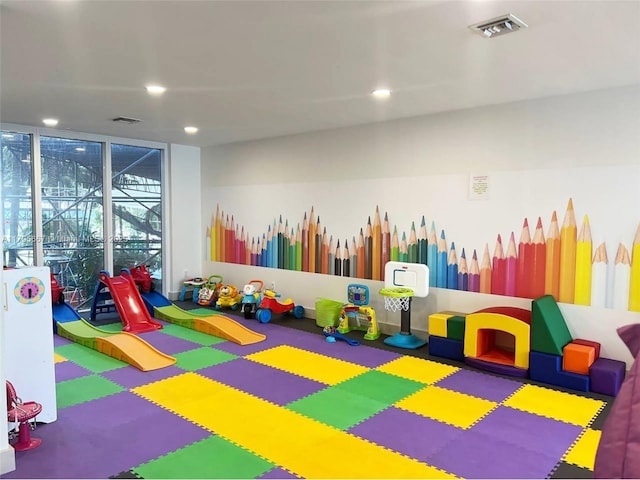 playroom with visible vents, recessed lighting, and tile patterned floors