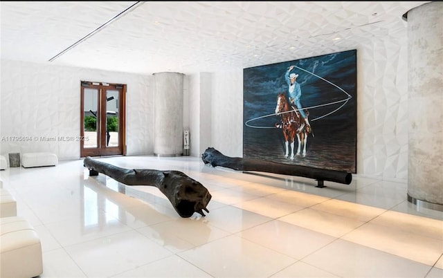 rec room with tile patterned flooring