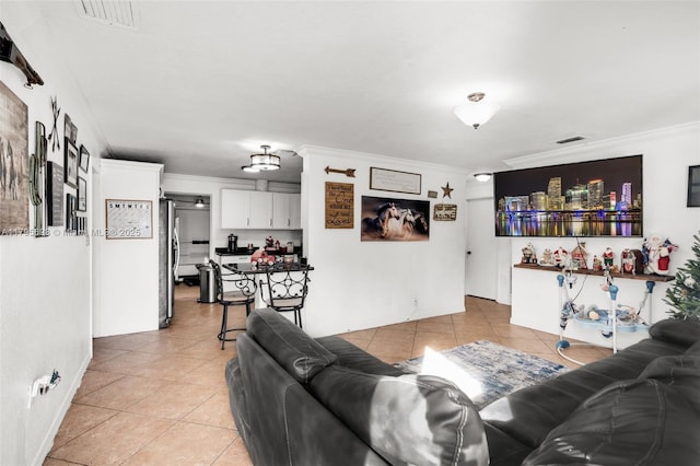 6645 Raleigh St, Hollywood, FL 33024 - living room with visible vents, ornamental molding, and light tile patterned floors