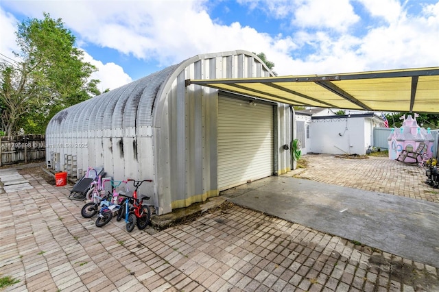 6645 Raleigh St, Hollywood, FL 33024 - view of outdoor structure with fence and an outbuilding
